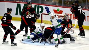 Vancouver Canucks left wing Kiefer Sherwood (44) celebrates his goal against the Ottawa Senators during third period NHL hockey action in Ottawa, on Saturday, Nov. 23, 2024. (Justin Tang/CP)