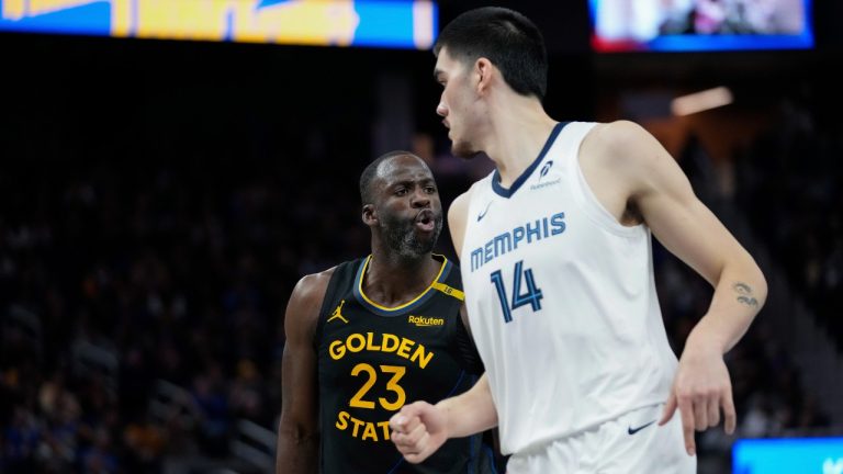 Golden State Warriors forward Draymond Green, left, reacts after making a three-point basket during the second half of an Emirates NBA Cup basketball game against the Memphis Grizzlies, Friday, Nov. 15, 2024, in San Francisco. (Godofredo A. Vásquez/AP)