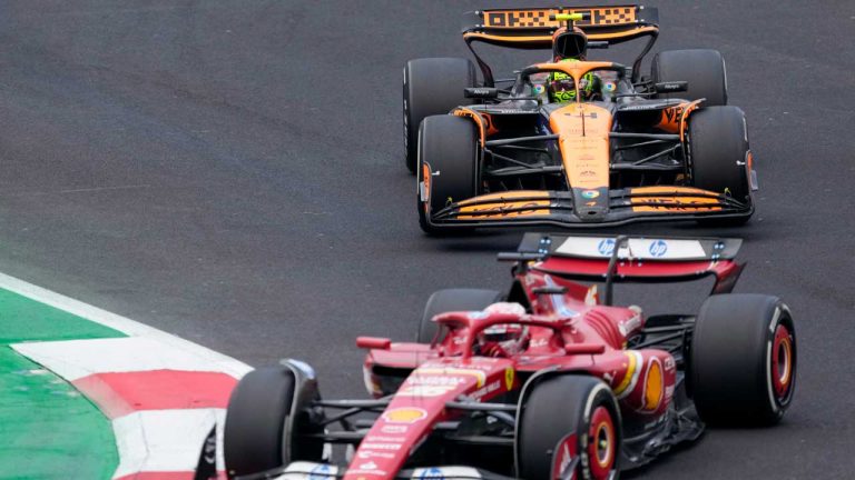 McLaren driver Lando Norris of Britain, top, and Ferrari driver Carlos Sainz of Spain steer their cars during the Formula One Mexico Grand Prix auto race at the Hermanos Rodriguez racetrack in Mexico City. (Eduardo Verdugo/AP)