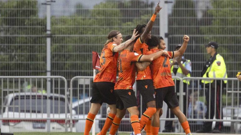 Forge FC players celebrate a goal against Toronto FC during first half Canadian Championship semifinal action in Hamilton, Ont. (Nick Iwanyshyn/THE CANADIAN PRESS)
