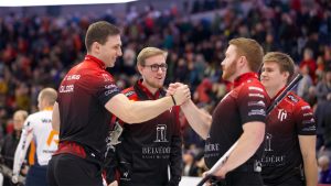 From left to right, Simon Gloor, Marco Hoesli, Justin Hausherr and Philipp Hoesli celebrate duing the Kioti National on Nov. 29, 2024, in St. John's, N.L. (Anil Mungal/GSOC)