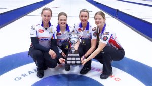 Rachel Homan, Tracy Fleury, Emma Miskew and Sarah Wilkes celebrate with the Co-op Canadian Open trophy on Sunday, Nov. 10, 2024 in Nisku, Alta. (Anil Mungal/GSOC)