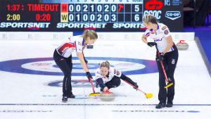 Rachel Homan (centre) shoots a stone during the Kioti National on Nov. 29, 2024, in St. John's, N.L. (Anil Mungal/GSOC)