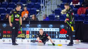 Brad Jacobs (centre) shoots a stone during the Kioti National on Nov. 29, 2024, in St. John's, N.L. (Anil Mungal/GSOC)