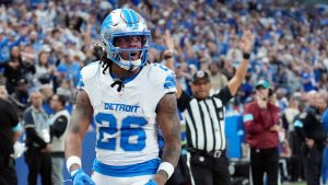 Detroit Lions running back Jahmyr Gibbs (26) reacts after his five-yard rushing touchdown during the second half of an NFL football game against the Indianapolis Colts, Sunday, Nov. 24, 2024, in Indianapolis. (AJ Mast/AP)