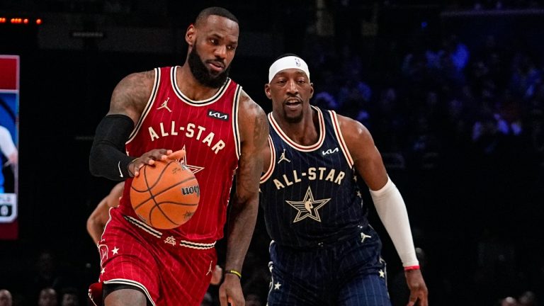 Los Angeles Lakers forward LeBron James (23) drives past Miami Heat center Bam Adebayo during the first half of an NBA All-Star basketball game in Indianapolis, Sunday, Feb. 18, 2024. (Darron Cummings/AP)