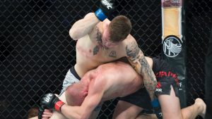 Jimmy Crute elbows Misha Cirkunov during a UFC Fight Night bout in Vancouver in 2019. (Jonathan Hayward/CP)