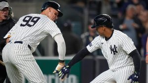 New York Yankees' Juan Soto celebrates with Aaron Judge (99) after hitting a home run during the fifth inning of a baseball game against the Baltimore Orioles, Wednesday, Sept. 25, 2024, in New York. (Bryan Woolston/AP)