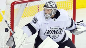 Los Angeles Kings goalie Darcy Kuemper makes a save on a Calgary Flames shot during first period NHL hockey action in Calgary, Alta., Monday, Nov. 11, 2024. (Larry MacDougal/CP)