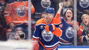 Edmonton Oilers' Connor McDavid (97) celebrates his 1000th point, against the Nashville Predators during second period NHL action in Edmonton on Thursday, November 14, 2024. (Jason Franson/CP Photo)