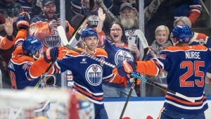 Edmonton Oilers' Connor McDavid (97) celebrates his 1000th point, against the Nashville Predators during second period NHL action in Edmonton on Thursday, November 14, 2024. (Jason Franson/CP)