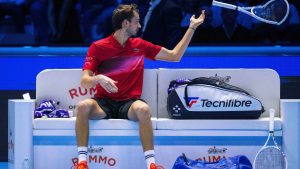 Daniil Medvedev throws a broken racket during his singles tennis match of the ATP World Tour Finals against Taylor Fritz, of the United States, at the Pala Alpitour, in Turin, Italy, Sunday, Nov. 10, 2024. (Marco Alpozzi/LaPresse via AP)