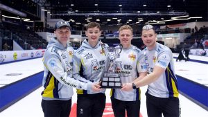 Bruce Mouat, Grant Hardie, Bobby Lammie and Hammy McMillan Jr. celebrate with the Co-op Canadian Open trophy on Sunday, Nov. 10, 2024, in Nisku, Alta. (Anil Mungal/GSOC)