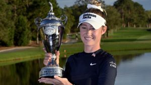 Nelly Korda holds the championship trophy after winning the the LPGA Annika golf tournament at Pelican Golf Club, Sunday, Nov. 17, 2024, in Belleair, Fla. (Steve Nesius/AP)