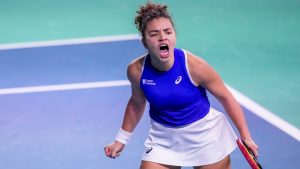 Italy's Jasmine Paolini celebrates after winning against Japan's Moyuka Uchijima during the Billie Jean King Cup Finals, at the Martin Carpena Sports Hall, in Malaga, southern Spain, on Saturday, Nov. 16, 2024. (Manu Fernandez/AP)