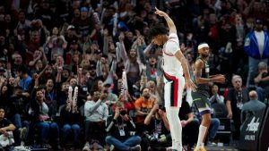 Portland Trail Blazers guard Shaedon Sharpe reacts after making a 3-point basket against the Minnesota Timberwolves during the second half of an NBA basketball game in Portland, Ore., Wednesday, Nov. 13, 2024. (Craig Mitchelldyer/AP)