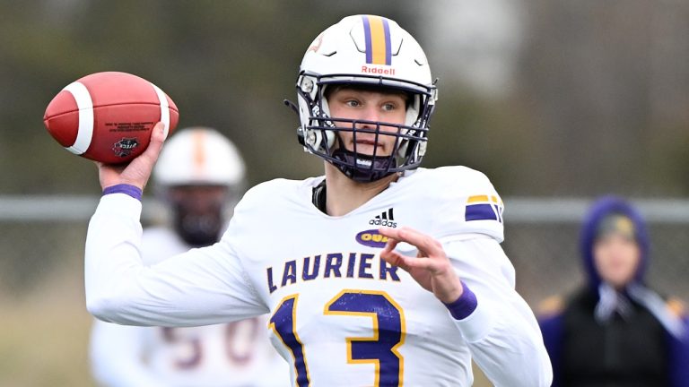 Laurier Golden Hawks quarterback Taylor Elgersma throws a pass during first half Uteck Bowl football action against Bishop's Gaiters in Lennoxville, Que., Saturday November 16, 2024. (Graham Hughes/CP)