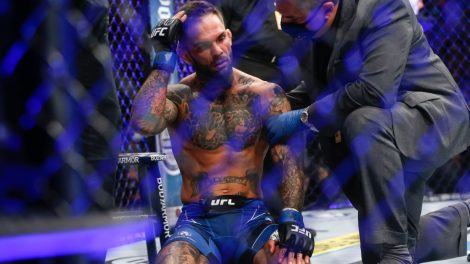 Former-UFC-bantamweight-champion-Cody-Garbrandt-is-checked-by-officials-after-a-loss