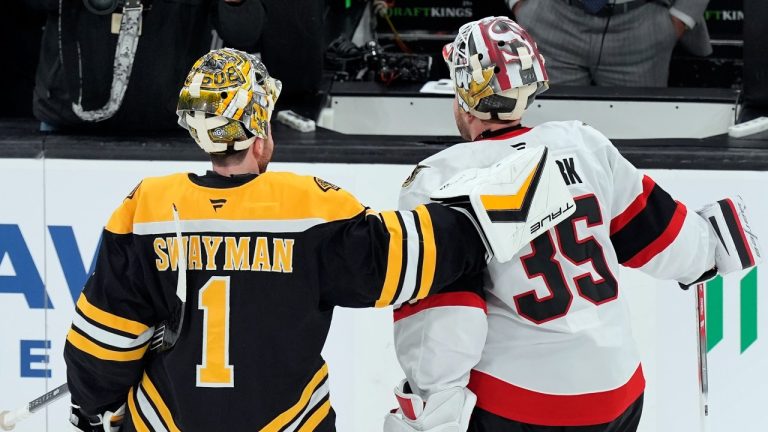 Boston Bruins' Jeremy Swayman (1) and Ottawa Senators' Linus Ullmark (35) pose for a photo before an NHL hockey game, Saturday, Nov. 9, 2024, in Boston. (Michael Dwyer/AP Photo)