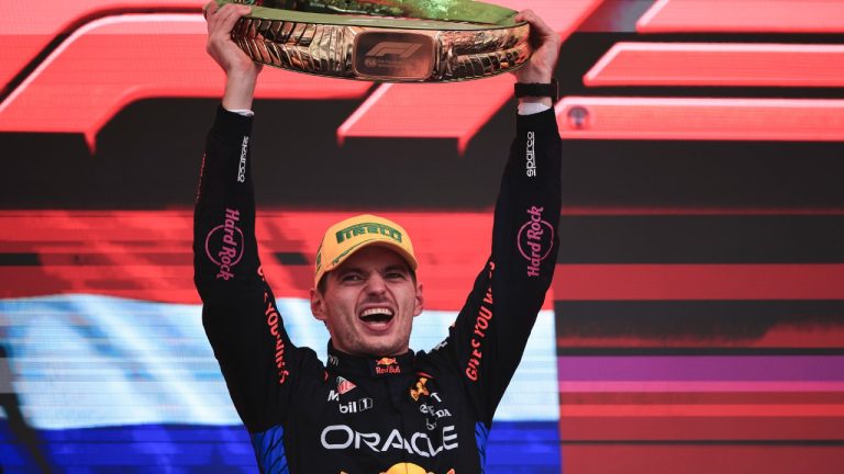 Red Bull driver Max Verstappen, of the Netherlands, celebrates on the podium his first place in the Brazilian Formula One Grand Prix at the Interlagos race track in Sao Paulo, Sunday, Nov. 3, 2024. (Ettore Chiereguini/AP)