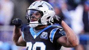 Carolina Panthers running back Chuba Hubbard celebrates after a long run against the Arizona Cardinals during overtime of an NFL football game, Sunday, Dec. 22, 2024, in Charlotte, N.C. (Rusty Jones/AP)