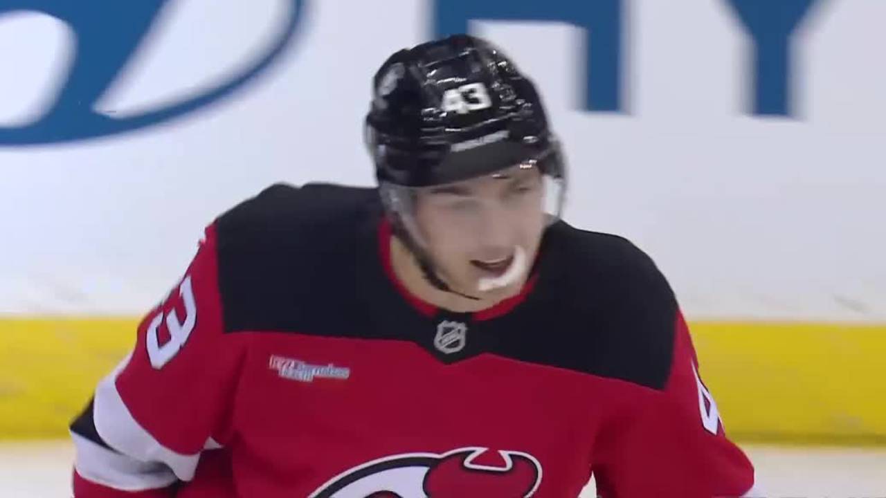 Devils’ Luke Hughes snipes goal on a pass from brother Jack