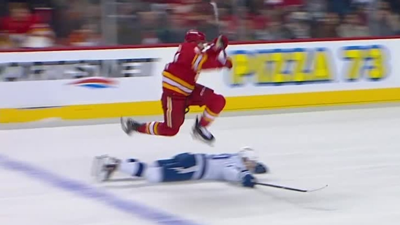 Flames’ Kadri leaps over Moser to fire home goal on the break