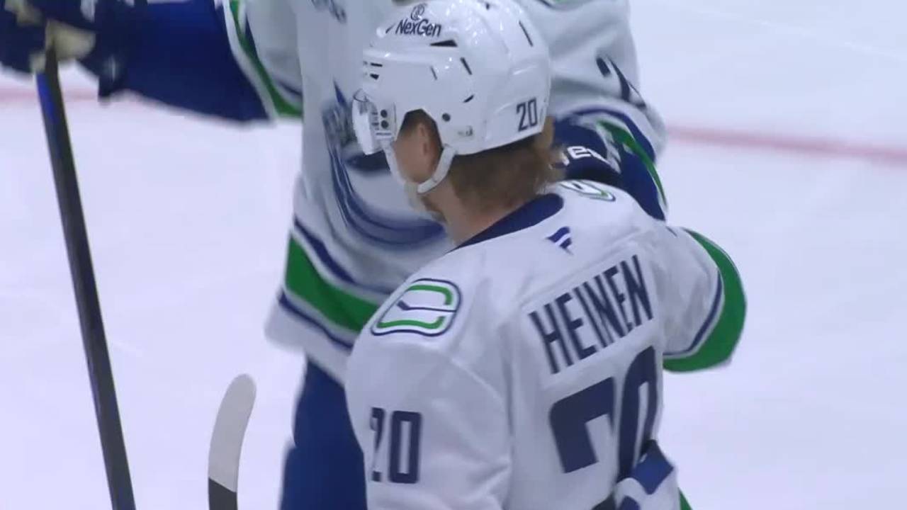 Canucks’ Heinen contorts body to score power-play goal