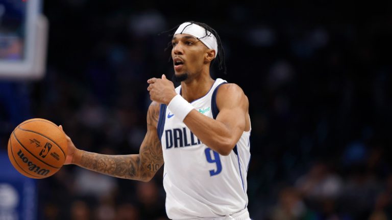 Dallas Mavericks guard A.J. Lawson (9) calls a play during an NBA preseason basketball game against the Memphis Grizzlies in Dallas, Monday, Oct. 7, 2024. (Gareth Patterson/AP)