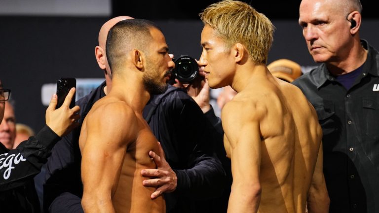 Alexandre Pantoja, left, and Kai Asakura face off at the UFC 310 ceremonial weigh-ins (UFC Press)