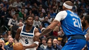 Minnesota Timberwolves guard Anthony Edwards (5) prepares to shoot a jump shot in the first half of an NBA basketball game against the Dallas Mavericks on Wednesday, Dec. 25, 2024, in Dallas. (Emil T. Lippe/AP)