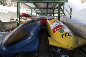 Bobsleds are parked next to the track in Cortina d'Ampezzo, Italy. (Gabriele Facciotti/AP)