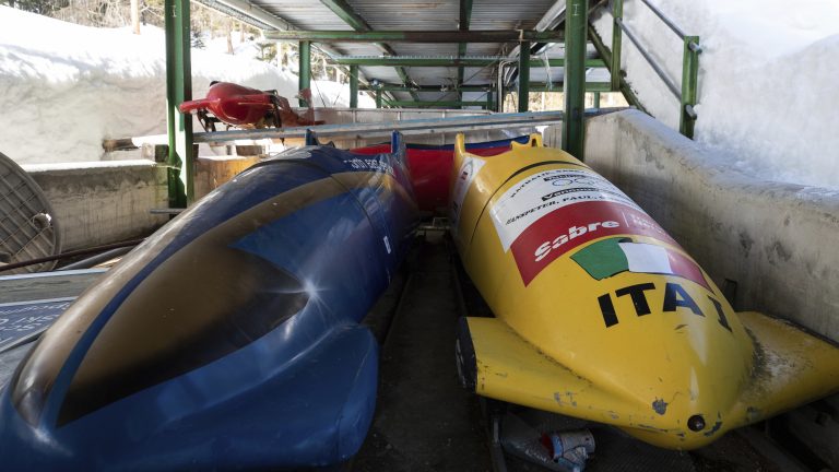 Bobsleds are parked next to the track in Cortina d'Ampezzo, Italy. (Gabriele Facciotti/AP)