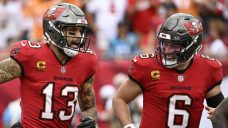 Mayfield helps Bucs keep playoff, NFC South hopes alive with rout of Panthers