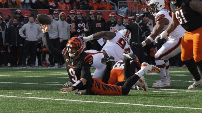 Cincinnati Bengals quarterback Joe Burrow (9) throws for a touchdown during the first half of an NFL football game against the Cleveland Browns, Sunday, Dec. 22, 2024, in Cincinnati. (Jeff Dean/AP)