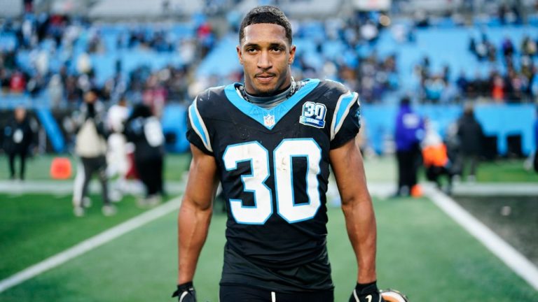 Carolina Panthers running back Chuba Hubbard leaves the field after scoring the winning touchdown against the Arizona Cardinals during overtime of an NFL football game, Sunday, Dec. 22, 2024, in Charlotte, N.C. (Jacob Kupferman/AP)