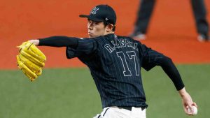 Chiba Lotte Marines Roki Sasaki pitches during a game against the Orix Buffaloes in Osaka, western Japan, Sunday, April 24, 2022. (Kyodo News via AP)