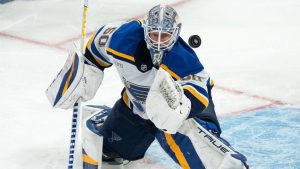 St. Louis Blues goaltender Jordan Binnington (50) makes a save during second period NHL hockey action against the Montreal Canadiens Saturday, October 26, 2024 in Montreal. (Ryan Remiorz/CP)