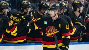 Vancouver Canucks' Elias Pettersson celebrates his goal with his teammates during the second period of an NHL hockey game against the Pittsburgh Penguins in Vancouver, on Saturday, October 26, 2024. (Ethan Cairns/CP)