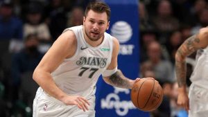 Dallas Mavericks guard Luka Doncic brings the ball up the court during the first half of an NBA basketball game against the San Antonio Spurs Saturday, Nov. 16, 2024, in Dallas. (Jeffrey McWhorter/AP)