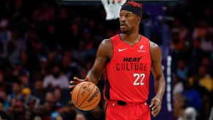 Miami Heat forward Jimmy Butler brings the ball upcourt against the Charlotte Hornets during the second half of an NBA basketball game in Charlotte, N.C., Wednesday, Nov. 27, 2024. (Nell Redmond/AP)