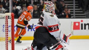 Ottawa Senators goaltender Linus Ullmark watches as the puck lands in the net off a shot by Anaheim Ducks right wing Troy Terry (19) during a shootout in an NHL hockey game, Sunday, Dec. 1, 2024, in Anaheim, Calif. (Jayne-Kamin-Oncea/AP) 