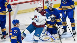 Colorado Avalanche left wing Artturi Lehkonen (62) celebrates after scoring during the third period of an NHL hockey game against the Buffalo Sabres in Buffalo, N.Y., Tuesday, Dec. 3, 2024. (Adrian Kraus/AP)