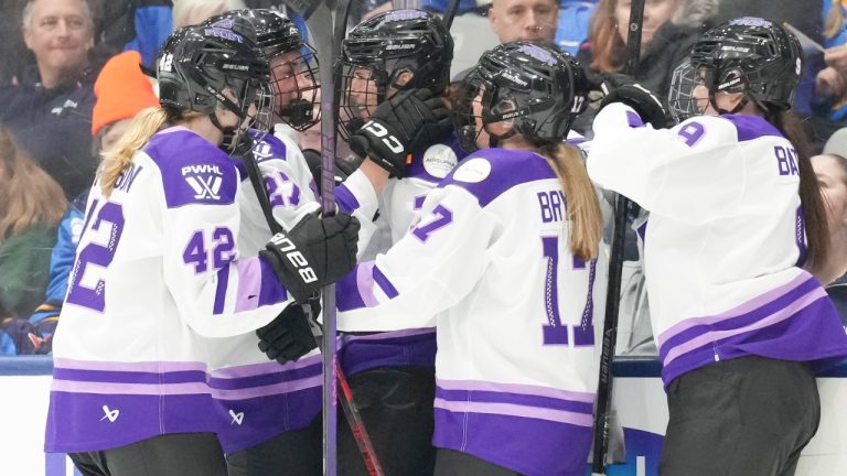 Minnesota Frost's Britta Curl, centre, celebrates with teammates after scoring against Toronto Sceptres during third period PWHL hockey action on Saturday, December 7, 2024. THE CANADIAN PRESS/Chris Young