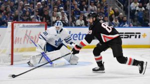 Buffalo Sabres right wing Alex Tuch (89) controls the puck in front of Toronto Maple Leafs goalie Matt Murray (30) during the second period of an NHL hockey game. (Adrian Kraus/AP)