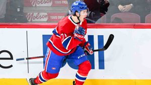 Montreal Canadiens' Jake Evans reacts after scoring against the Detroit Red Wings during first period NHL hockey action in Montreal, Saturday, December 21, 2024. (Graham Hughes/CP)