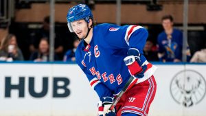 New York Rangers defenseman Jacob Trouba skates with the puck during the second period of an NHL hockey game against the Anaheim Ducks, Monday, Oct. 17, 2022, in New York. (Julia Nikhinson/AP) 