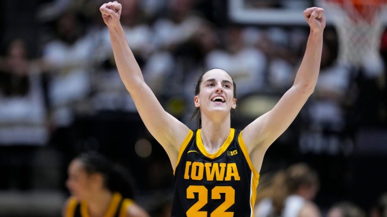 Iowa guard Caitlin Clark (22) celebrates in the second half of an NCAA college basketball game against the Purdue in West Lafayette, Ind., Wednesday, Jan. 10, 2024. (Michael Conroy/AP)