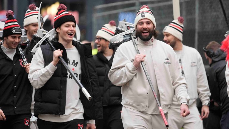 Chicago Blackhawks left wing Lukas Reichel, left, and left wing Patrick Maroon arrive with the team for the NHL Winter Classic outdoor hockey game featuring the Blackhawks and St. Louis Blues at Wrigley Field, Tuesday, Dec. 31, 2024, in Chicago. (Erin Hooley/AP)