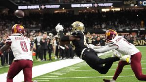 New Orleans Saints tight end Juwan Johnson (83) missed a two point conversion in the second half of an NFL football game against the Washington Commanders in New Orleans, Sunday, Dec. 15, 2024. (AP Photo/Gerald Herbert) 